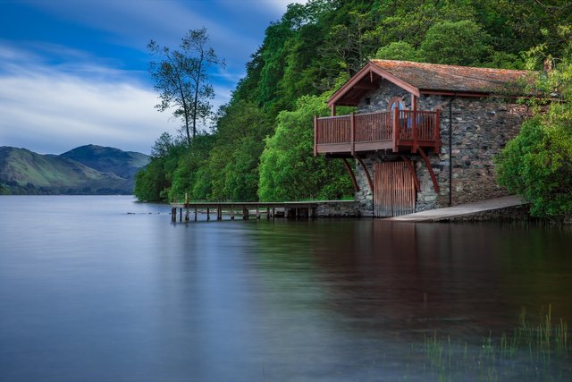 boat-house-cottage-waters-lake-65225.jpeg