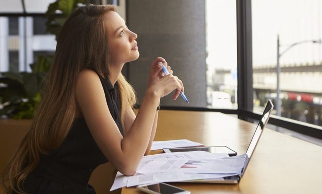 businesswoman-working-in-an-office-looking-out-of-the-window_1514387499-850x514.jpg