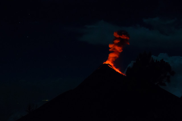 Volcano Fuego erupting at night