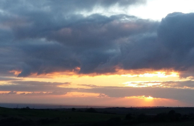 Sunset Beyond The Clouds.jpg